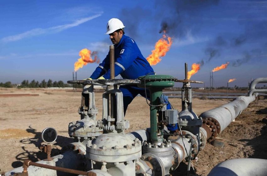 A Worker Controlling A Valve In An Oil Field In Iraq. Photo Ina 850x560