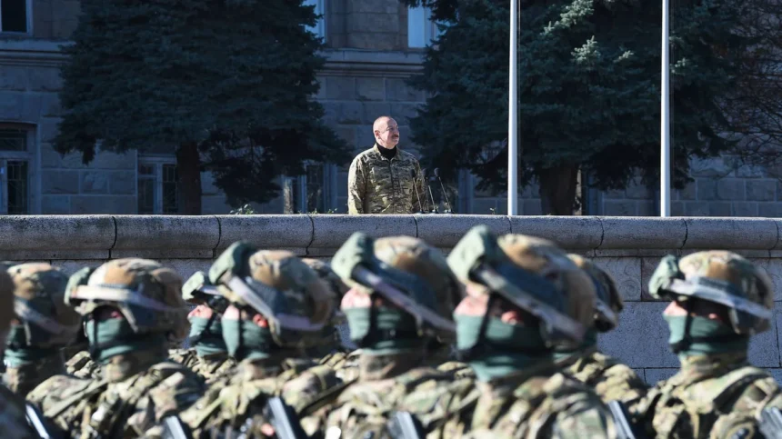 Azerbaijani president ilham aliyev at a military parade in the nagorno karabakh region nov 2023 afp.jpg