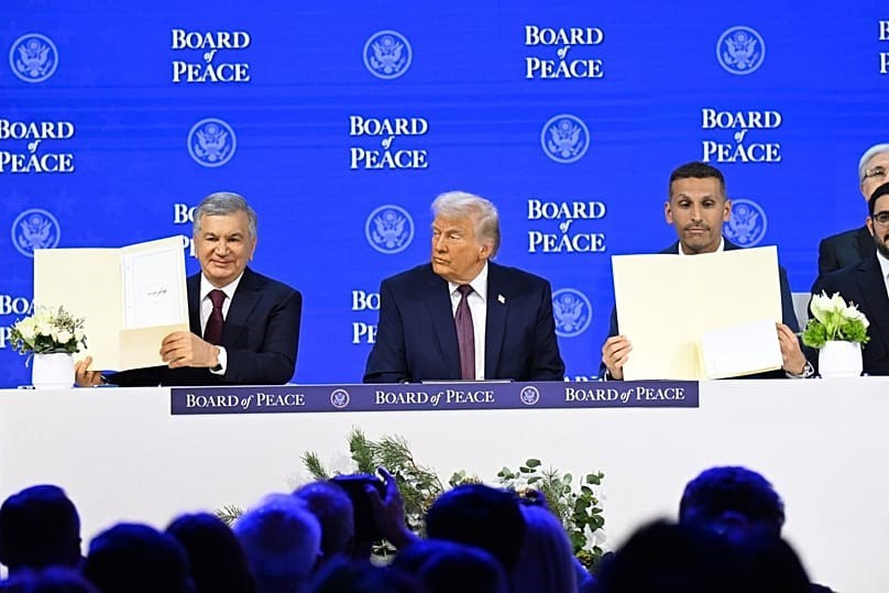 Uzbekistans President Shavkat Mirziyoyev signed the founding charter of the Board of Peace in Davos image Press Service of Uzbekistans President